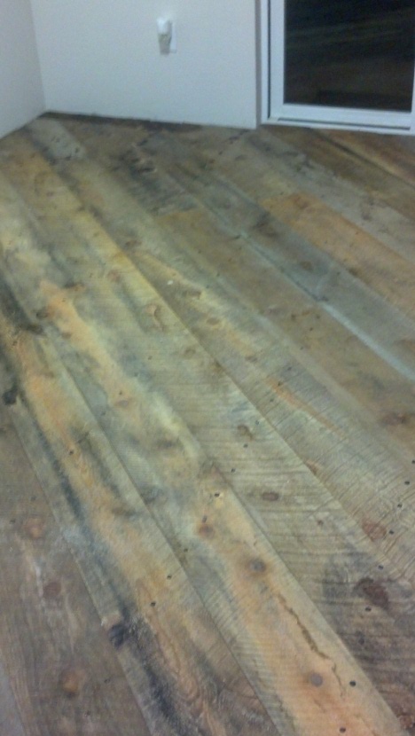 Wooden barn board floor before the application of Epoxy.com product #15